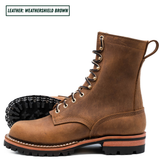 A pair of rugged lace-up ankle boots in a distressed brown leather, with one boot standing upright and the other lying on its side to show the black treaded outsole. A text label in the top left corner reads 'LEATHER: WEATHERSHIELD BROWN'.