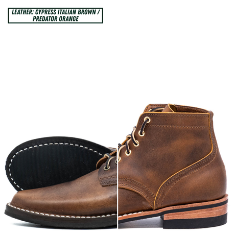 A single lace-up ankle boot shown on a white background with a split view: the left half shows the black outsole with white stitching, and the right half shows the brown leather upper. Text at the top reads 'LEATHER: CYPRESS ITALIAN BROWN / PREDATOR ORANGE'.