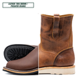 A split view of a brown leather ankle boot, showing the side profile with a pull tab and the toe end with white stitching, alongside a black outsole detail. Text in the top left reads 'LEATHER: 1964 BROWN / PREDATOR ORANGE'.