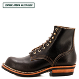 A single dark brown leather lace-up boot shown in side profile on a white background, with a text label in the top-left corner reading 'LEATHER: BROWN WAXED FLESH'. The boot has tan stitching, brass eyelets, and a stacked sole with a tan midlayer and black outsole.