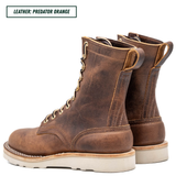 A pair of rugged lace-up leather boots in a distressed brown finish, shown on a clean white background with a text label in the top left reading 'LEATHER: PREDATOR ORANGE'.