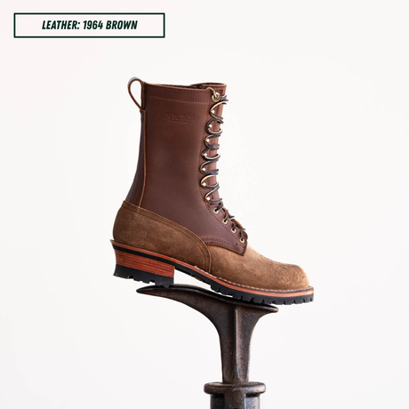 Brown leather boot sitting on boot jack in front of white background. Top left text reads 'LEATHER: 1964 BROWN'.