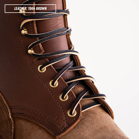 Zoomed in detail shot of relief notch on HD lace up build your own. Top left reads 'LEATHER: 1964 BROWN'.