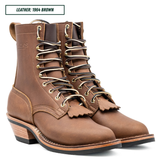 A pair of brown leather lace-up boots with metal eyelets and a stacked wood-look heel, shown on a white background with a text label reading 'LEATHER: 1964 BROWN'.