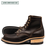 A pair of dark brown leather lace-up boots with a stacked wood-look heel and contrast stitching, shown on a white background with a text label in the top left corner.