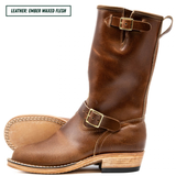 A pair of mid-calf brown leather boots with buckle straps, shown on a white background with a text label in the top left corner reading 'LEATHER: EMBER WAXED FLESH'.