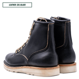 A pair of black leather lace-up ankle boots shown from the side and back on a white background, with a text label in the top left reading 'LEATHER: CXL BLACK'.
