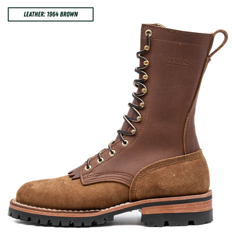 A single mid-calf lace-up boot shown in side profile on a white background, with a text label in the top-left corner reading 'LEATHER: 1964 BROWN'. The boot has a dark brown leather upper, a medium brown suede toe and heel panel, black laces, brass eyelets, and a black lug sole with a tan midsole layer.