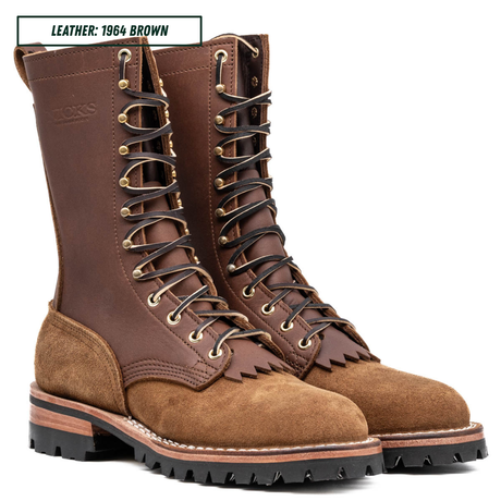 A pair of high-top lace-up boots in brown leather and suede, shown on a white background with a text label in the top-left corner that reads 'LEATHER: 1964 BROWN'.