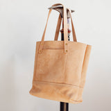 Veg Tan Suede Tote hanging on boot jack