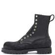 Black leather boot with gold eyelets on a white background