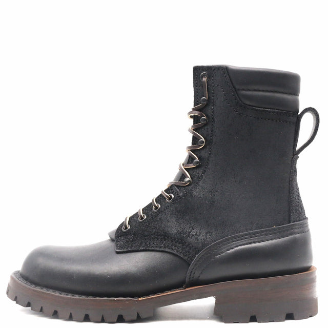 A black leather lace-up ankle boot with a rugged lug sole and metal eyelets, shown from a side profile on a white background.