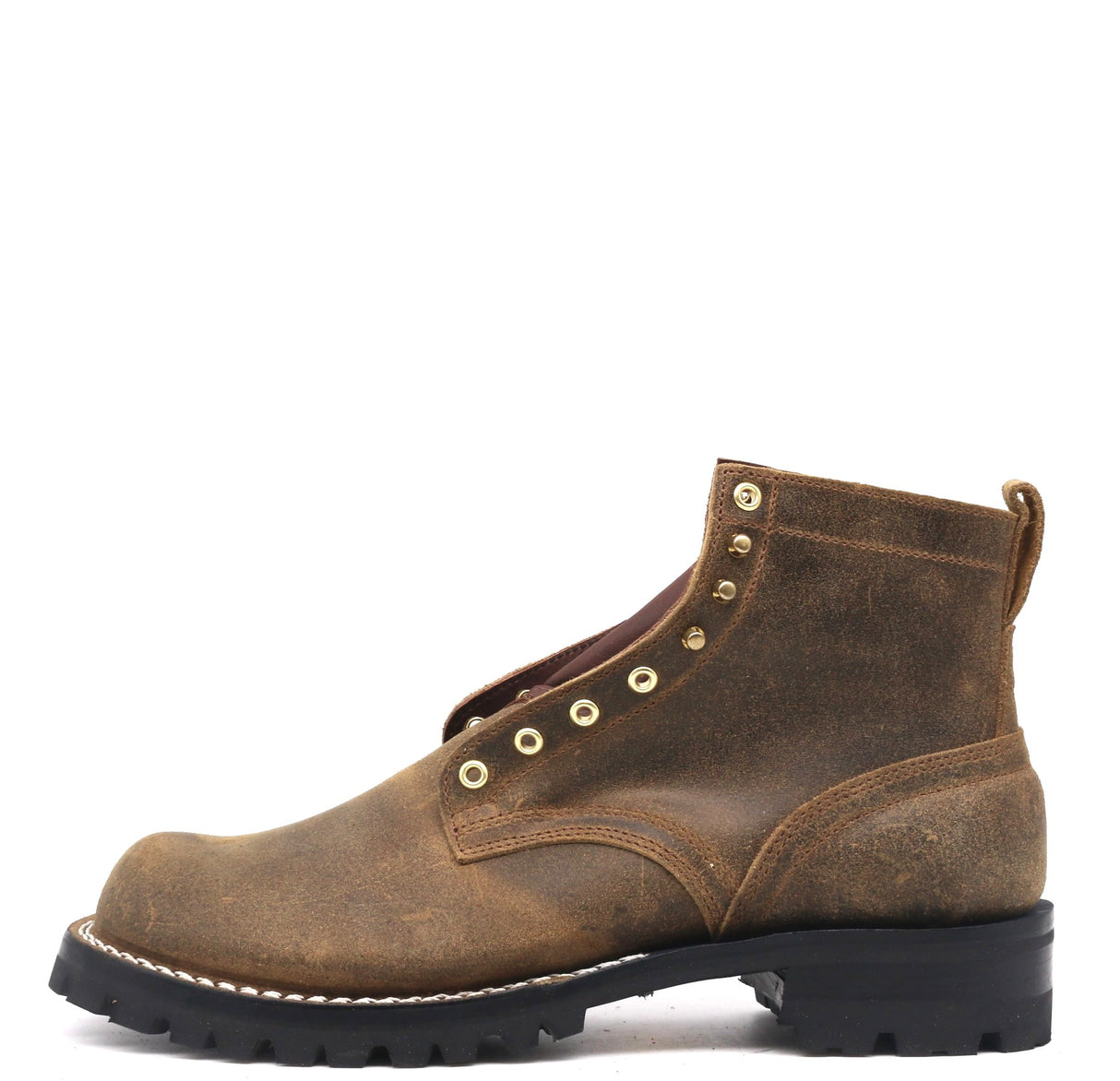 Brown leather boot with black sole on a white background
