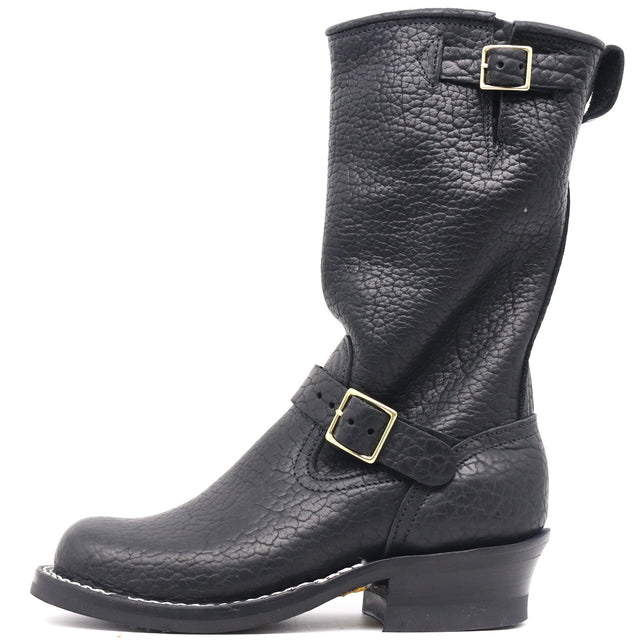 A black pebbled leather mid-calf boot with buckle straps, shown from a side profile on a white background.
