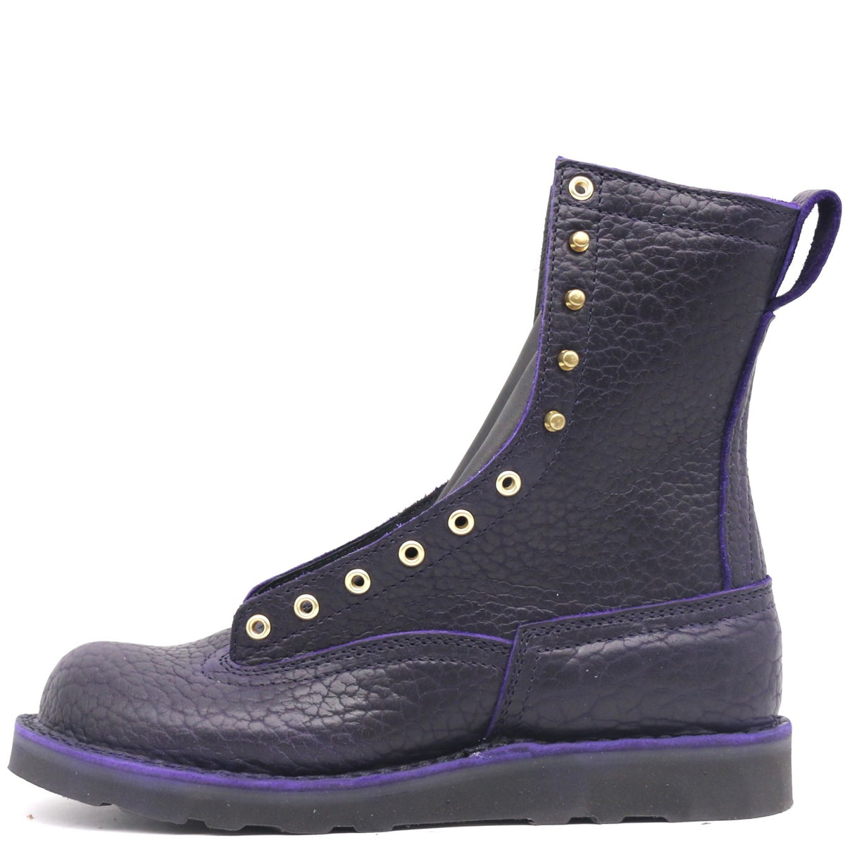 Dark purple boot with brass hardware on a black wedge sole, against a white background