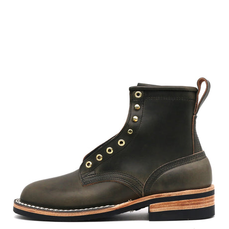 A dark olive green leather lace-up ankle boot with brass eyelets, a pull tab, and a stacked wood-and-leather sole, shown from a side profile on a white background.