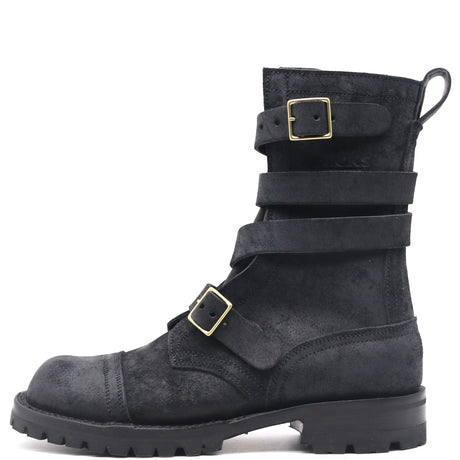 A black suede ankle boot with multiple strap buckles and a pull loop, shown from the side on a white background.