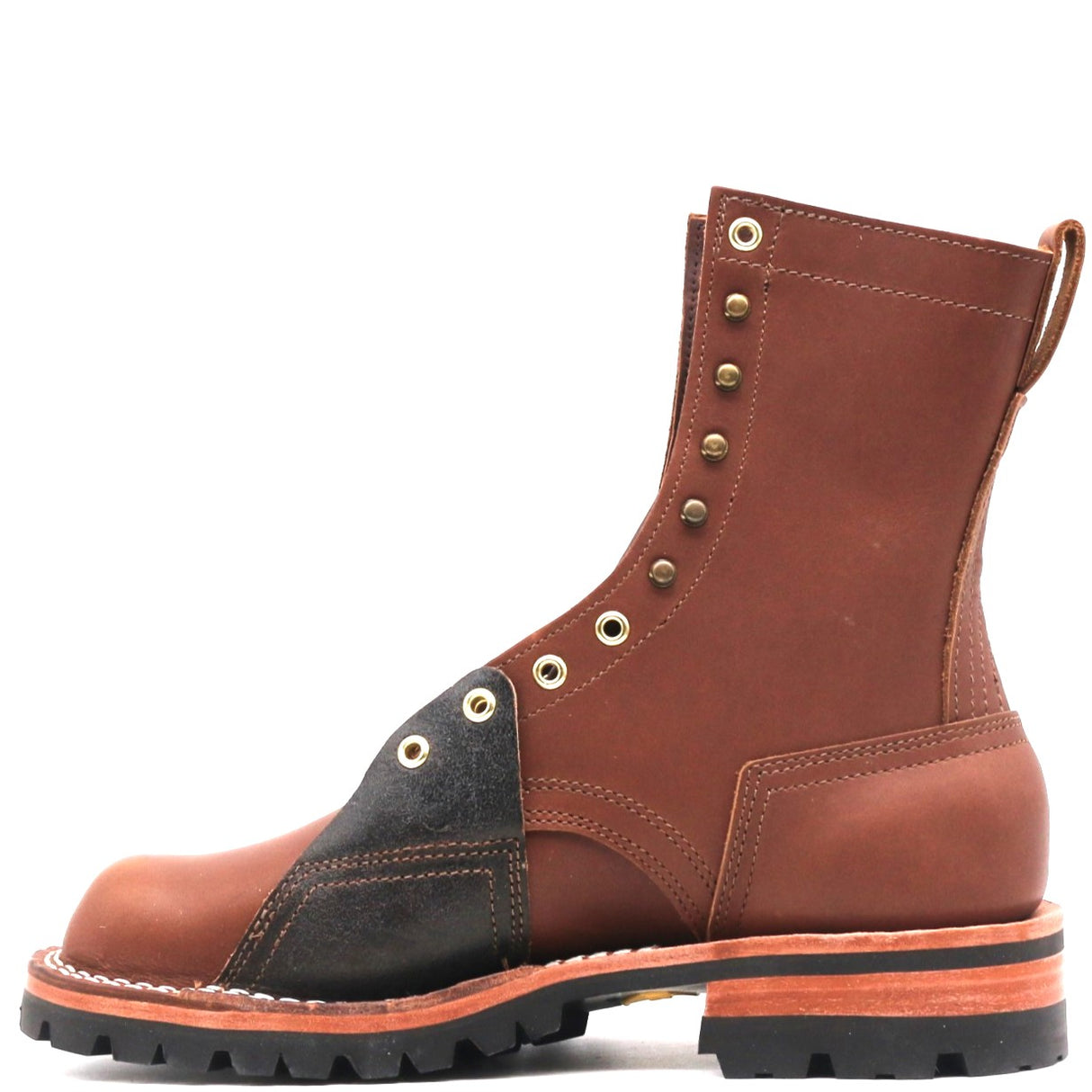 A brown leather lace-up work boot with a black leather toe overlay, brass eyelets, and a rugged black sole, shown from a side profile on a white background.