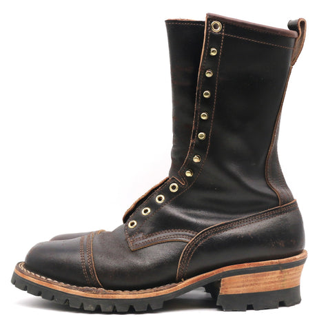 A dark brown leather lace-up boot with brass eyelets, a chunky wood-look heel, and a rugged black sole, shown from a side profile on a white background.