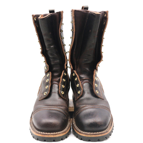 A pair of dark brown leather lace-up boots with metal studs and eyelets, shown from the front against a plain white background.