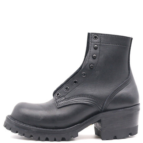 A black leather ankle boot with a chunky lug sole, low block heel, and decorative metal eyelets on the side, shown against a plain white background.