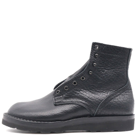 A single black leather ankle boot with a pebbled texture, lace-up front, and thick black sole, shown from a side profile on a white background.