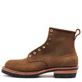 A brown suede lace-up ankle boot with brass eyelets, a pull tab, and a black lug sole, shown from a side profile on a white background.