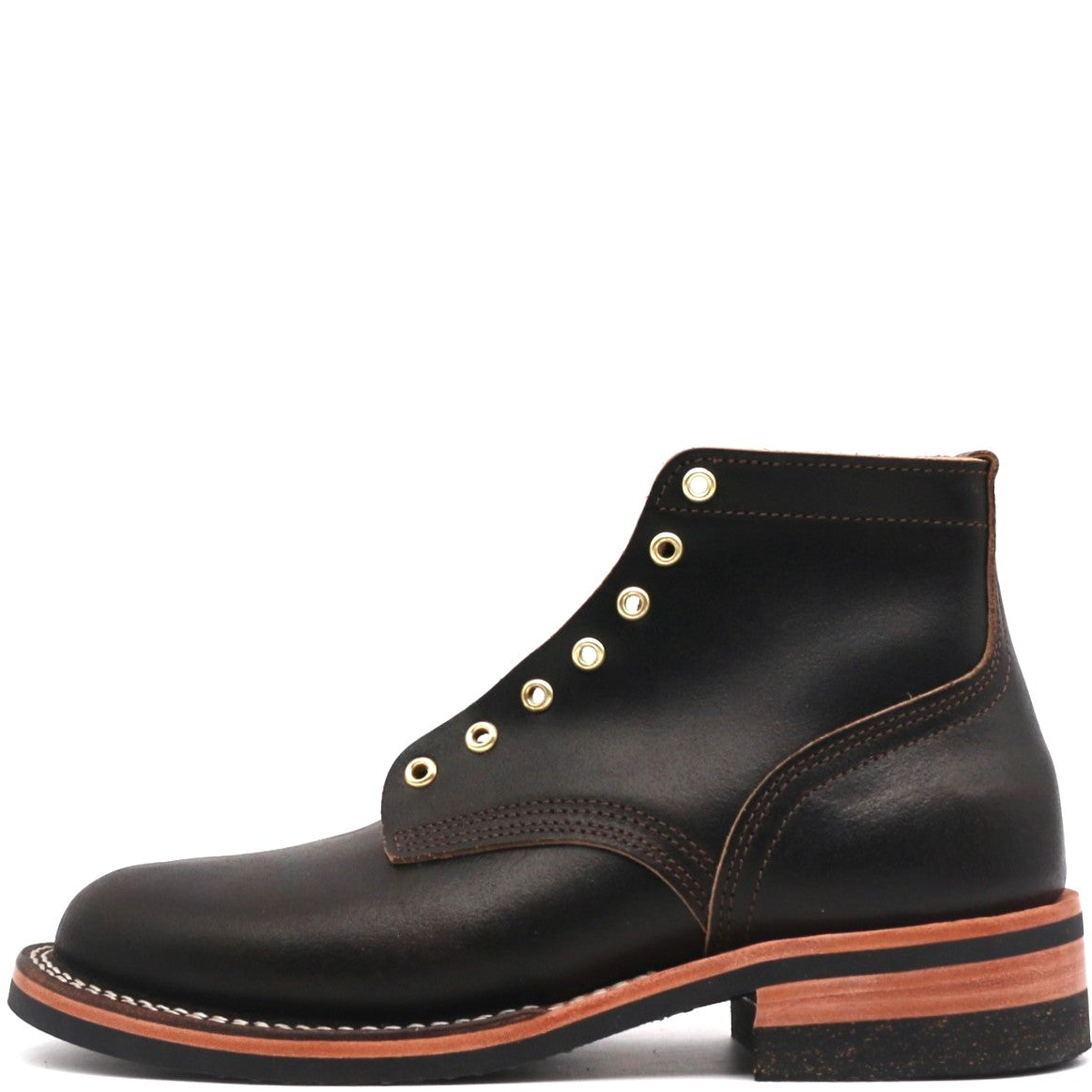 A single black leather lace-up ankle boot with gold-tone metal eyelets, a stacked black sole, and a tan leather midsole, shown from a side profile on a white background.