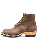 A brown leather lace-up ankle boot with brass eyelets, a stacked wood-look heel, and a black outsole, shown from a side profile on a white background.