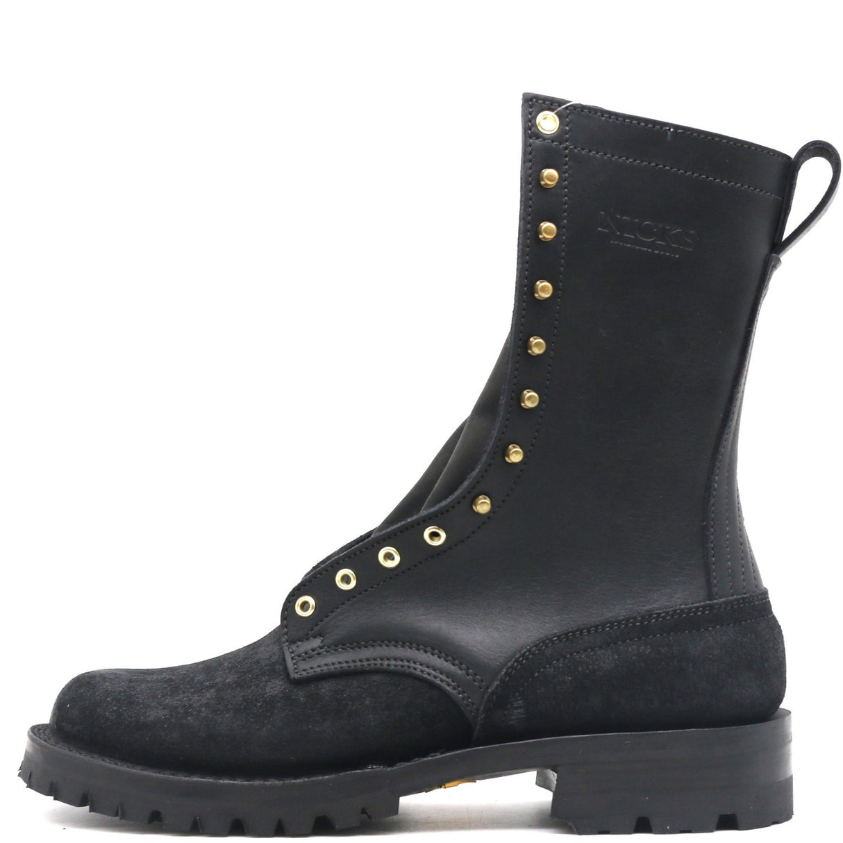 A black leather and suede combat boot with gold-tone metal eyelets and studs, shown from a side profile on a white background.