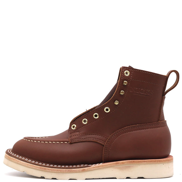 A single brown leather lace-up ankle boot with brass eyelets, contrast stitching, and a thick off-white sole, shown from a side profile on a white background.
