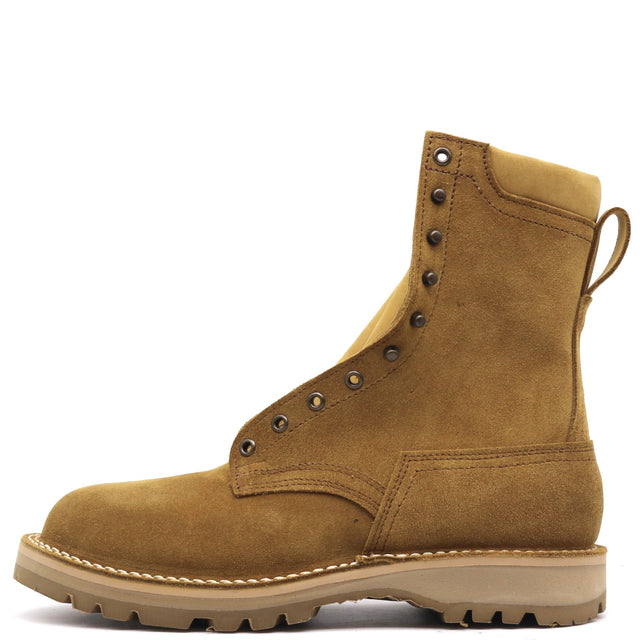 A single mid-calf work boot in tan suede with metal eyelets, contrast stitching, and a thick lug sole, shown from a side profile on a white background.