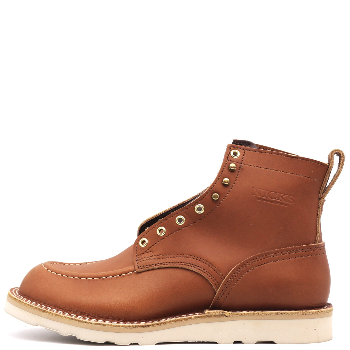 A single brown leather lace-up ankle boot with brass eyelets, contrast stitching, and a thick off-white sole, shown from a side profile on a white background.