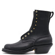 A black leather lace-up ankle boot with gold-tone metal eyelets and studs, featuring a low block heel and a pull tab, shown from a side profile on a white background.