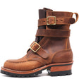 A brown leather ankle boot with three adjustable straps and gold-tone buckles, set against a plain white background.