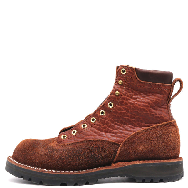 A single brown leather lace-up work boot with distressed detailing, brass eyelets, and a black rubber sole, shown from a side profile on a white background.