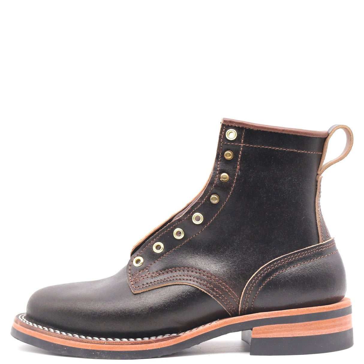 A dark brown leather lace-up ankle boot with brass eyelets, contrast stitching, and a stacked black and tan sole, shown from a side profile on a white background.