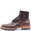 A dark reddish-brown leather lace-up ankle boot with a rugged black sole and a contrasting light brown midsole, shown from a side profile on a white background.