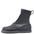 A single black leather and suede ankle boot with metal eyelets, white contrast stitching, and a pull tab on the heel, shown from a side profile on a white background.