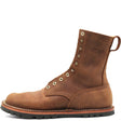 A brown leather lace-up boot with metal eyelets, a pull loop, and 'NICKS' embossed on the side, shown against a plain white background.
