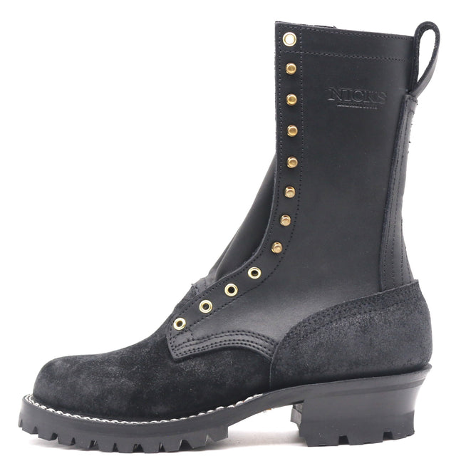 Tall black work boot with a lug outsole and brass hardware in front of a white background.