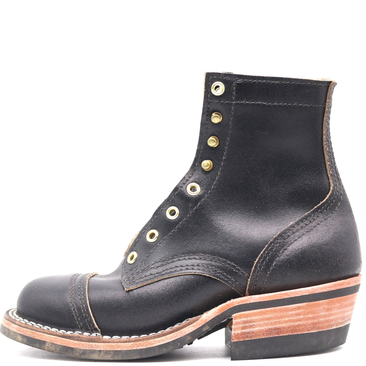 A black leather lace-up ankle boot with brass eyelets, a rounded toe, and a stacked wood-look heel, shown from a side profile on a white background.