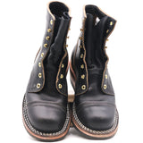 A pair of black leather lace-up ankle boots with gold-toned metal eyelets and studs, featuring contrast stitching around the toe and sole edge, photographed against a plain white background.