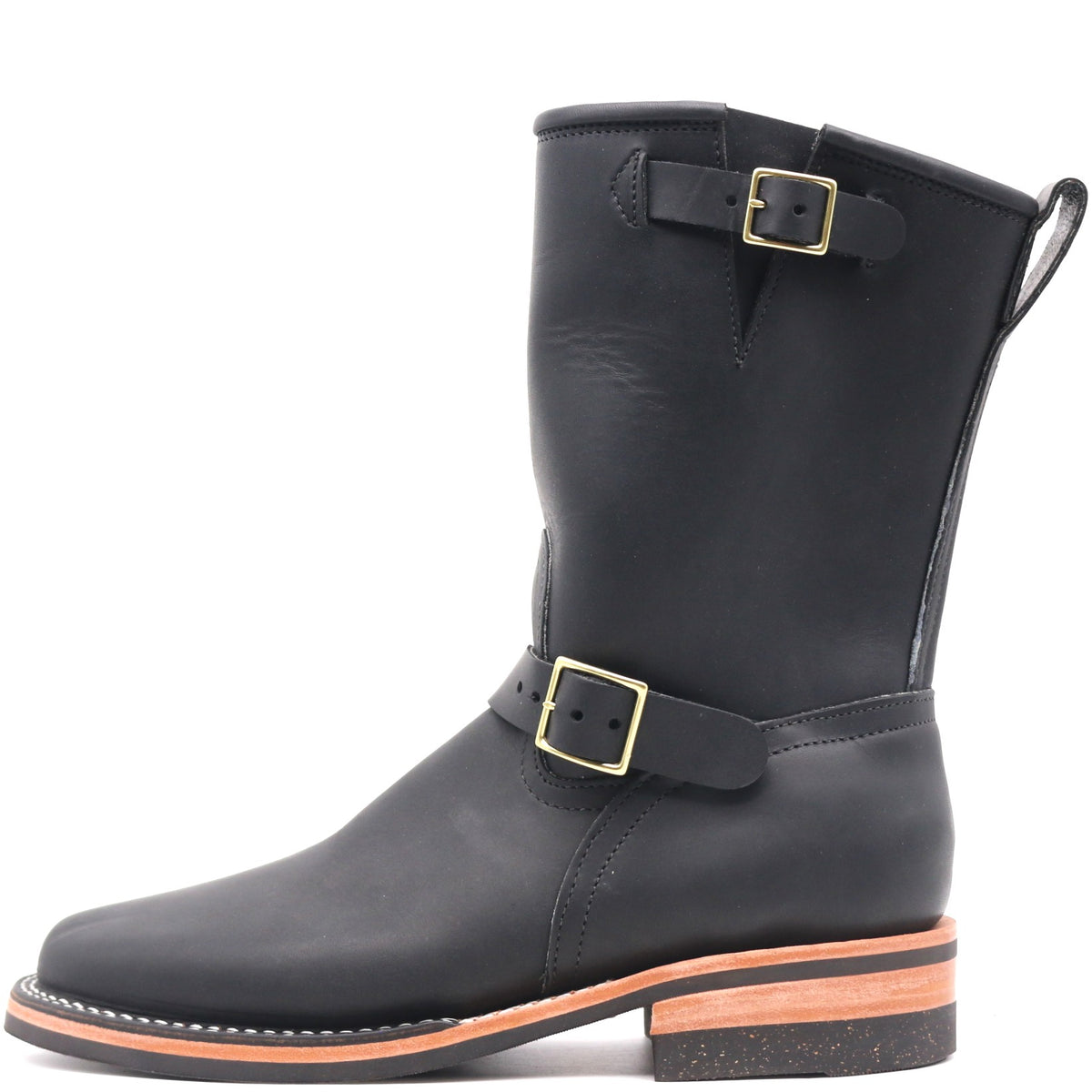 A black leather mid-calf boot with gold-tone buckle straps, a pull tab, and a stacked sole with a light brown mid-layer, shown against a plain white background.