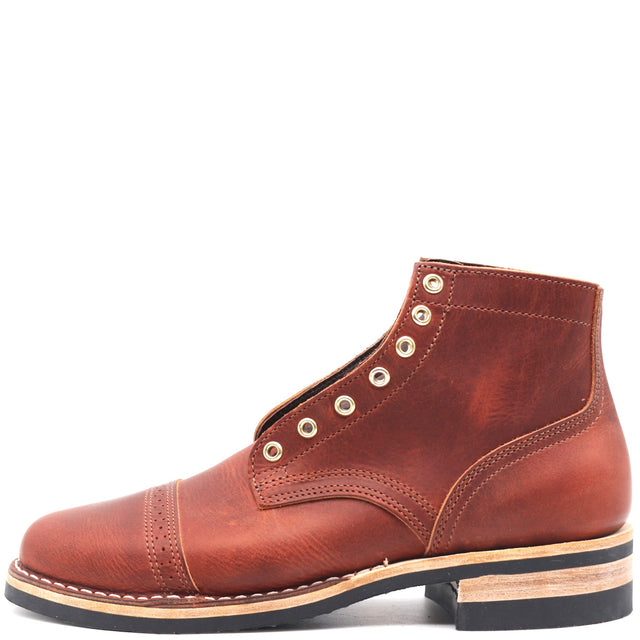A single brown leather lace-up ankle boot with decorative metal eyelets, a cap toe, and a stacked wood-and-leather heel, shown against a plain white background.