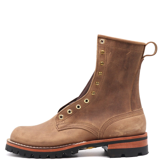 A brown suede lace-up ankle boot with brass eyelets, a pull loop, and a rugged black lug sole, shown from a side profile on a white background.