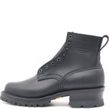 A black leather ankle boot with lace-up front, metal eyelets, a pull tab, and a chunky lug sole, shown from a side profile on a white background. The brand name 'NICKS' is embossed on the side.