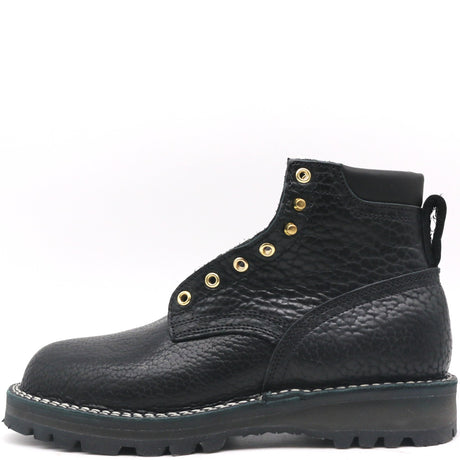 A black textured leather lace-up boot with gold-tone metal eyelets and a thick black lug sole, shown from a side profile on a white background.
