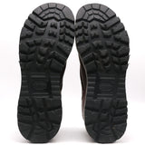 The treaded black rubber soles of a pair of boots, shown from the bottom against a plain white background. The Volar logo is embossed in the center of each sole.