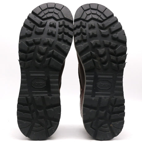 The treaded black rubber soles of a pair of boots, shown from the bottom against a plain white background. The Volar logo is embossed in the center of each sole.